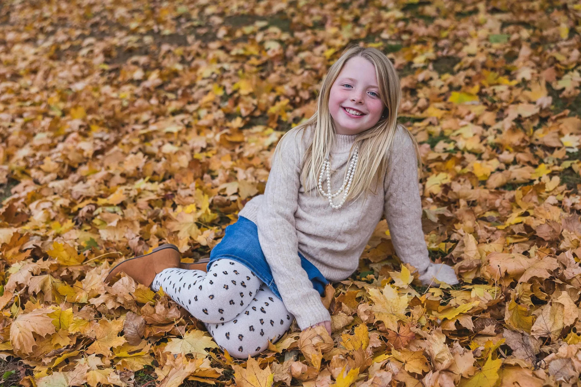 tights and sweaters are great layers for keeping warm in winter photo sessions in NH